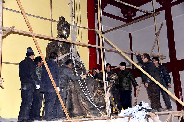 2014年2月13日，山东省茌平县韩屯镇鲁义姑祠鲁义姑舎子救侄铜像安放现场。 